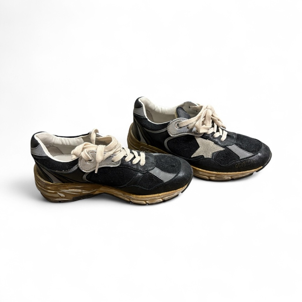 Golden Goose Black and Cream Dad-Star Sneakers